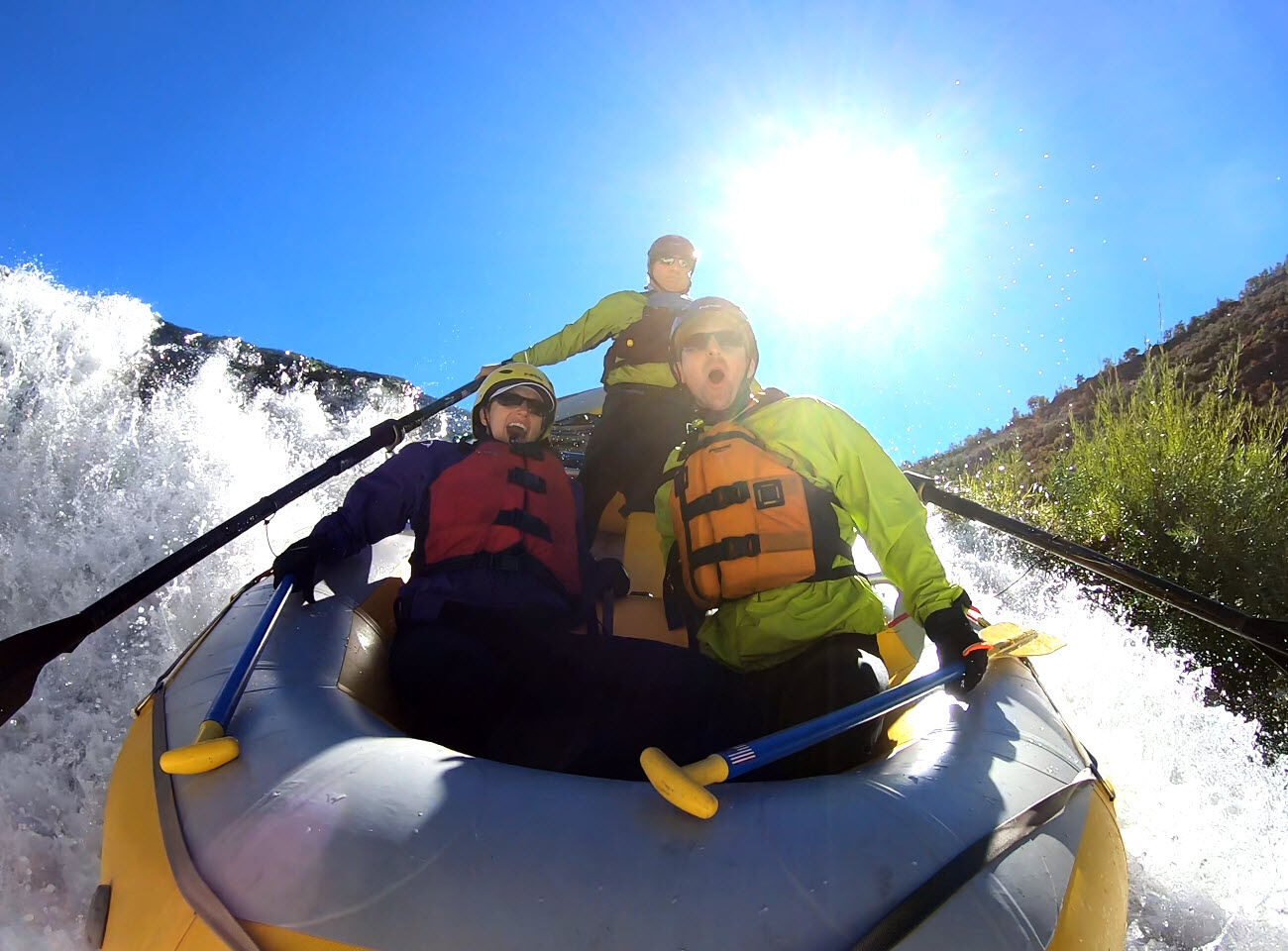 Raft going over waterfall