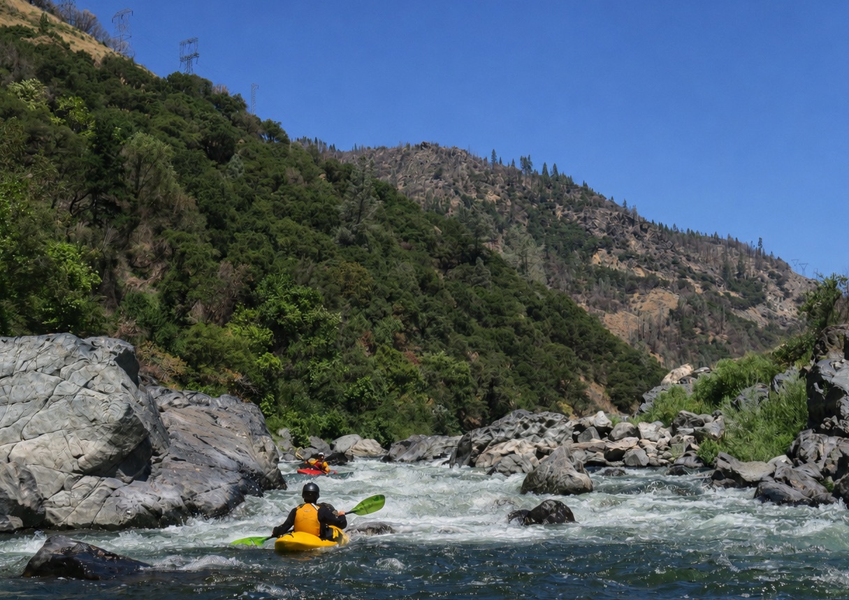 Kayakers on whitewater river