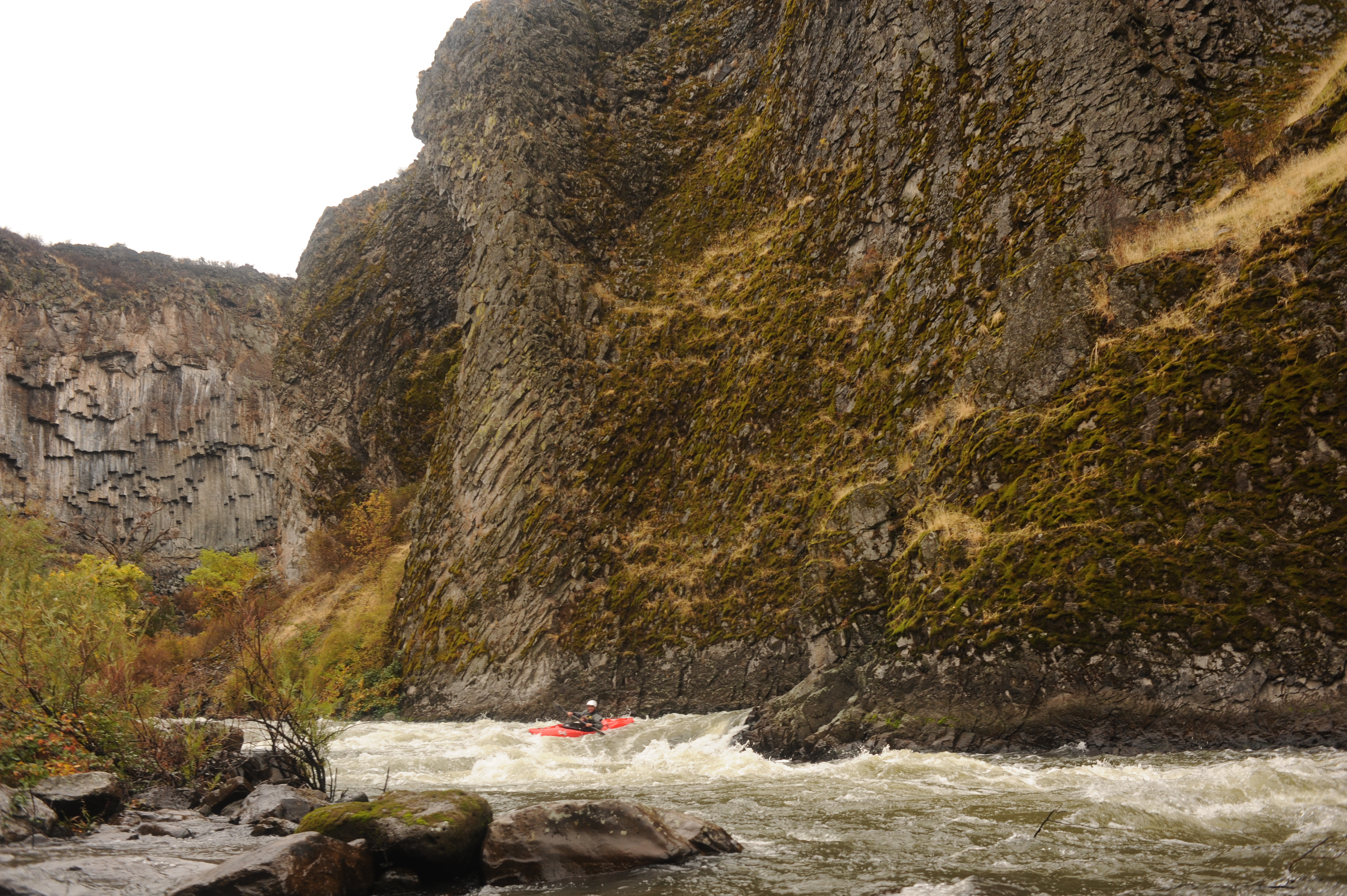 Kayaker in K’íka·c’é·ki Canyon.