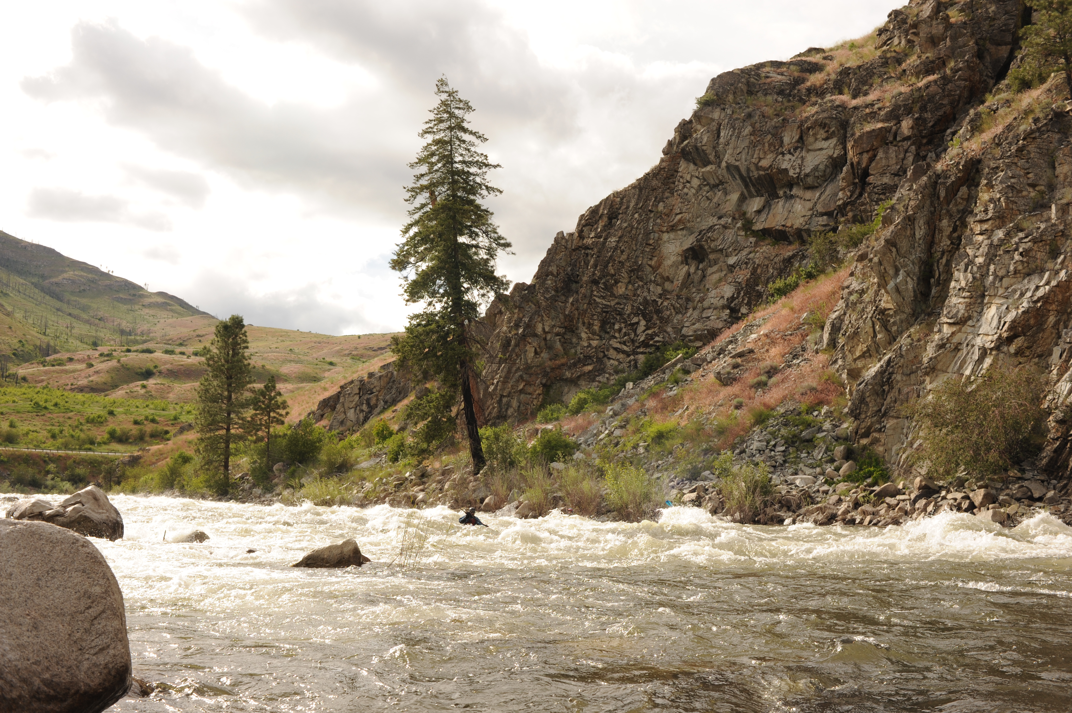 Kayaker coming through the Black Canyon of the Methow River.