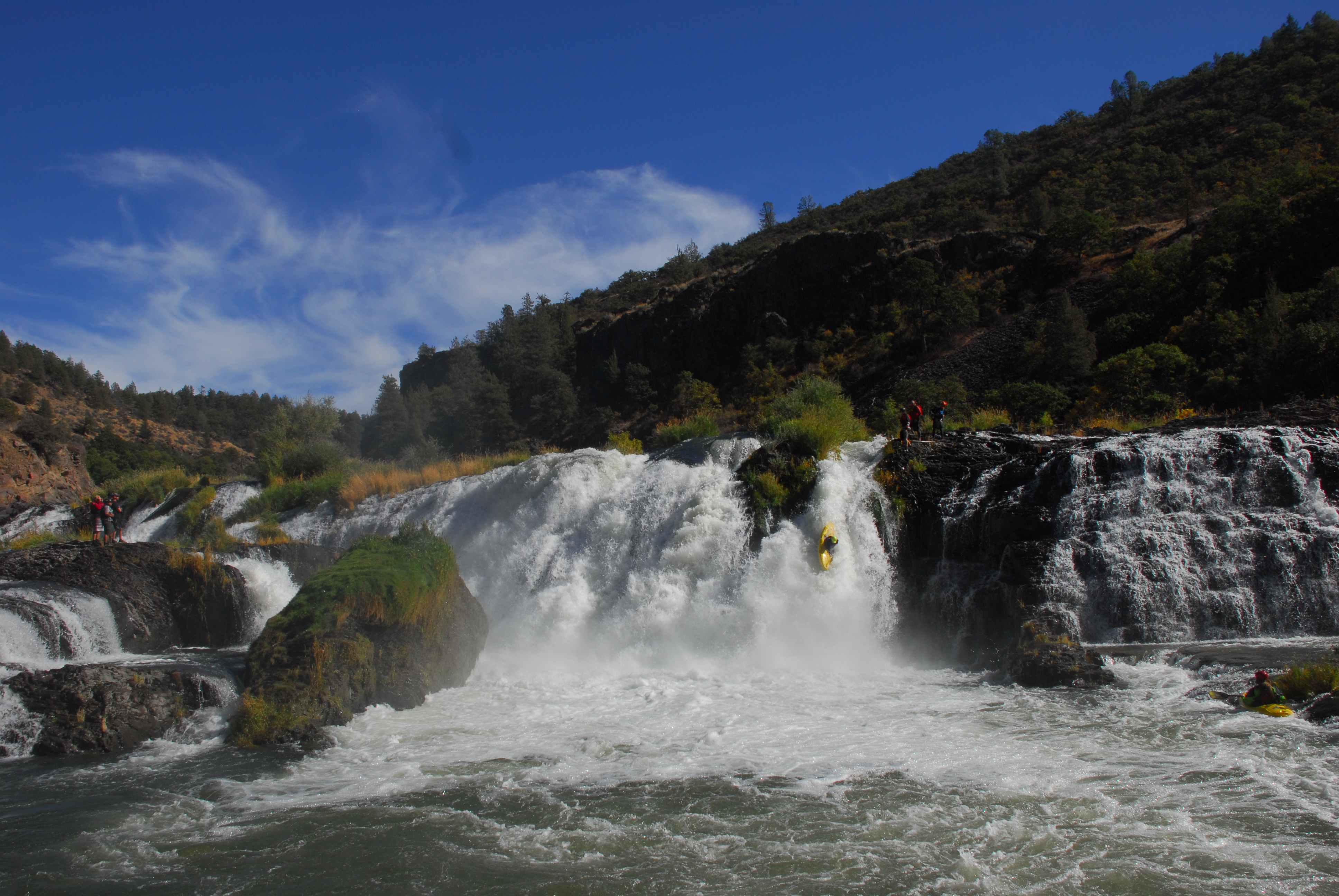 Kayaker going over Pit River Falls.