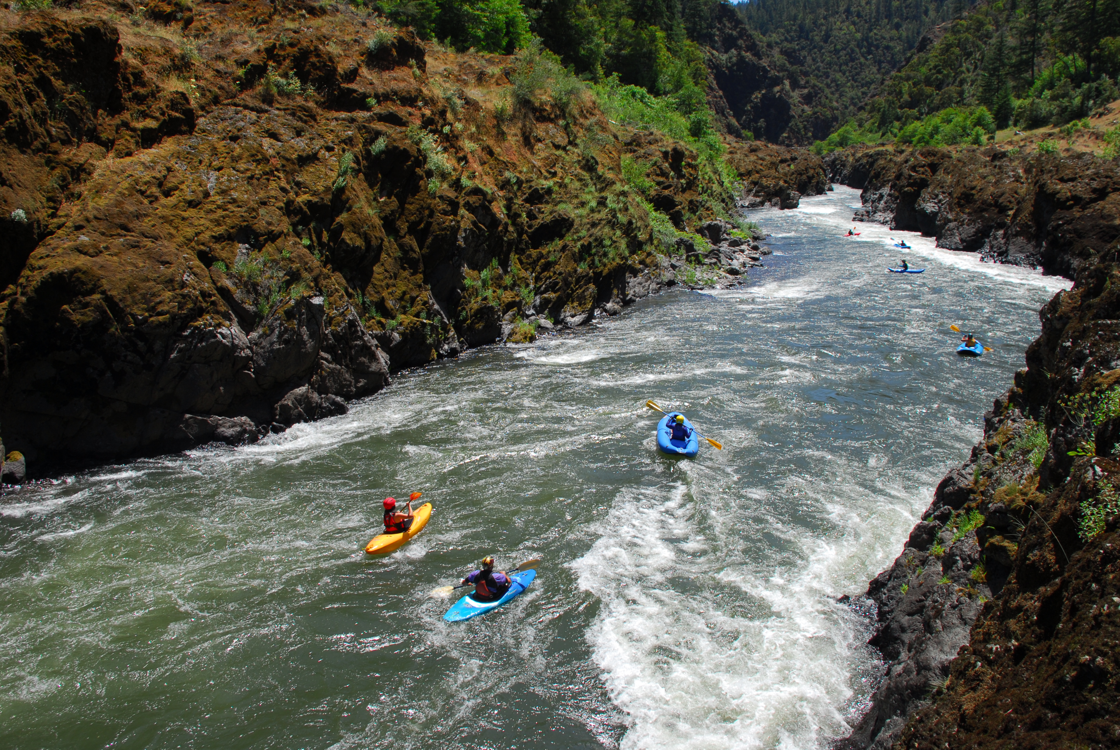 Kayakers in Mule Creek Canyon on the Rogue River.