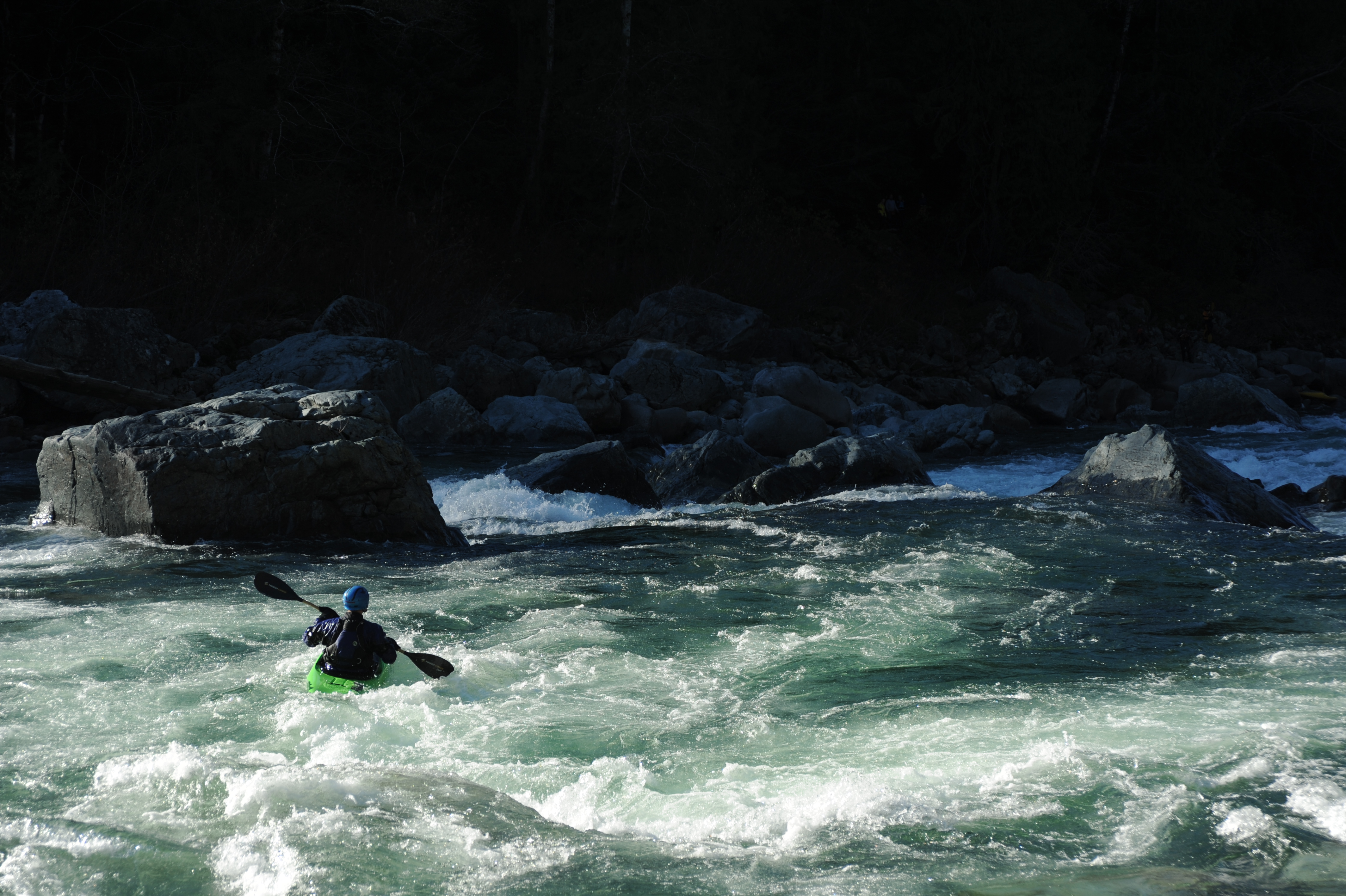 A kayaker on Boulder Drop rapid on the Skykomish River.